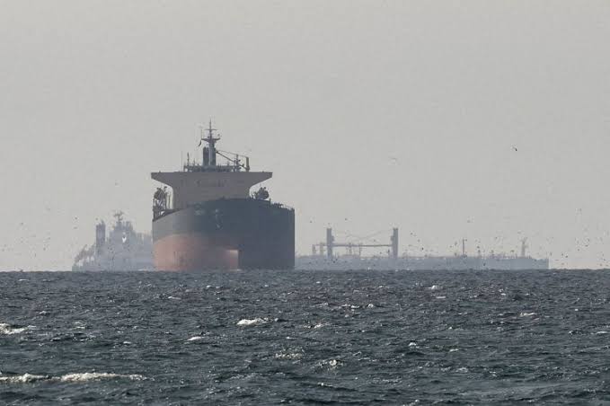 Oil tankers navigate shipping lanes near the Persian Gulf, AI generated