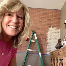 It was a process, but it was super fun to do! The dining room wall is  finally COMPLETE..after a three-step process of putting up faux brick  panels, then doing the German Schmeer