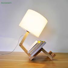 4.4 out of 5 stars. New Wood Sitting Boy Creative Solid Wood Table Lamp Bed Reading Lamps Fabric Lighting Table Light Led Lights Desk Lamps Aliexpress