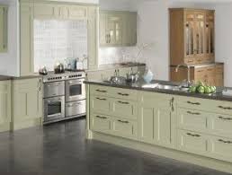 Sage Green With Dark Floor And Countertops Green Kitchen Cabinets Kitchen Cabinets Green Kitchen