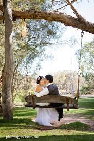 Most recent weekly top monthly top most viewed top rated longest shortest. A Romantic Setting Has Been Created By The Greenery And Old Swing At The Caversham House A Young Wedding Couple Is Taki Young Wedding Wedding Couples Wedding
