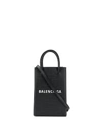 Celebs and their balenciaga bags. Shop Black Balenciaga Shopping Phone Holder Bag With Express Delivery Farfetch