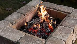 This guide teaches you how to build a fire pit using concrete pavers or concrete blocks for a quick, easy backyard upgrade that can be enjoyed in any season. How To Build A Fire Pit