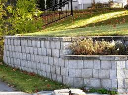 Colorful exterior cinder block wall painting ideas. How To Build A Retaining Wall From Concrete Blocks