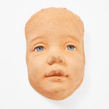 PETER LINDE. Cara de niño, terracota, firmada por Linde. Arte