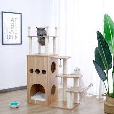 A cat tree (also referred to as a cat tree house, cat condo, kitty condo, cat stand, cat post catbox or cat tower) is an artificial structure for a cat to play, exercise, relax and sleep on. Cat Trees That Aren T Ugly And Look Great In Your Home Popsugar Pets