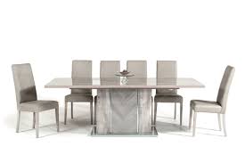 You can't go wrong with a modern wood dining table, and a sleek modern glass dining table is a smart choice for smaller rooms, where the transparency creates the illusion of space. Nova Domus Alexa Italian Modern Grey Extendable Dining Table