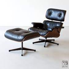 released in 1956 after years of development by designers charles and ray eames for the herman miller eames lounge chair charles eames lounge chair lounge chair