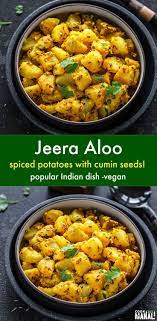 The Amazing Combination And Aroma Of Potatoes And Cumin Seeds Makes Jeera Aloo One Of The Most Indian Food Recipes Vegetarian Indian Dishes Indian Food Recipes
