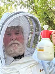 I have built a horizontal hive, I do not have anything with which to scorch  the hive before baiting, if I smoke the hive well, instead of scorching  before baiting, would this