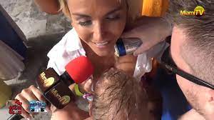 Saucy TV presenter Jenny Scordamaglia lets two lucky male fans drink beer  from her BOOBS and admits 'it feels really good' 