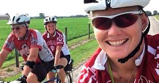 Bicyclists boost each other