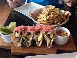 Sprinkle with salt and pepper. Drunken Fish Taco Plate Picture Of Guy Fieri S Vegas Kitchen Las Vegas Tripadvisor