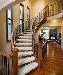 Calgary Home See The Double Sided Fire Place In The Background Love That Stairway Design Staircase Design Traditional Staircase