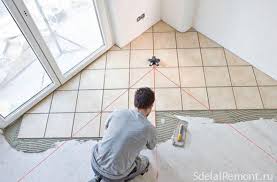 Diagonal herringbone tile floor being installed over ditra in a front hall, a 4x12 porcelain tile installed on a herringbone pattern. How To Put A Tile On The Diagonal Marking And Packing Technology
