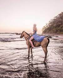 Ophelie Travel Blogger On Instagram Watching The Sunset At The Beach On The Back Of A Horse Priceles Horse Beach Riding Horse Girl Photography Cute Horses