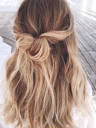 If you want to make that hairstyle pop, add some color to it. Half Up Bun Wedding Hairstyle Ecemella