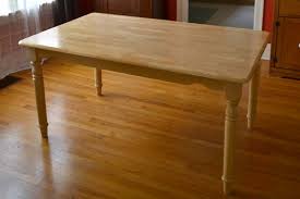 Sounds like a water based acrylic was sprayed on top and when the heat is added it makes the finish gummy. Refinishing Our Plain Jane Dining Table Lansdowne Life