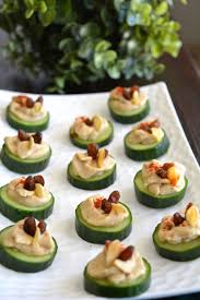 For holiday potlucks, i make an appetizer truffle out of prosciutto, figs and toasted pine nuts. Cucumber Hummus Canape My Signature Dish Recipe Vegan Party Food Canapes Recipes Vegan Appetizers