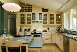 This kitchen offers a new twist on arts and crafts style. Bright Countertops Kitchen Contemporary With Slanted Ceiling Metal Look Mosaic Backsplash W Contemporary Kitchen Kitchen Cabinet Design Vaulted Ceiling Kitchen