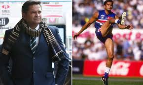 Former swans champion adam goodes recreated the iconic winmar pose himself. Afl Legend Nicky Winmar Admits To Assaulting A Taxi Driver Daily Mail Online