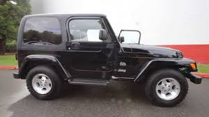Image result for Brilliant Black 2003 Jeep