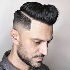 The fade haircut, also sometimes known as a taper, is the most popular way to cut a guy's hair on the sides and back. 25 Best Faded Hairstyles For Men With Long On Top Cool Men S Hair