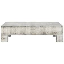Sure to brighten up your home in an instant, this stunning venetian coffee table finished off with a antique silver trim is sure to impress across. Phineas Industrial Loft Antiqued Mirror Rectangular Coffee Table Mirrored Coffee Tables Eclectic Coffee Tables Rectangular Coffee Table