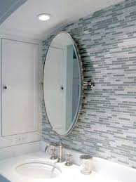How To Hang Oval Bathroom Pivot Mirror Oval Mirror Bathroom Bathroom Mirror Modern Contemporary Bathrooms