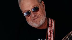 Utica musician John Savage returns with new album, "Empty Spaces"