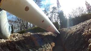 A basin should never be installed at the high point of a driveway or yard because this nullifies its usefulness. Install French Drain In Gravel Driveway By Apple Drains Youtube