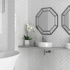 Monochromatic bathroom design ideas are usually stunning, just like this grey one. White Chevron Effect Wall Tiles Julien Macdonald 300 X 75mm Chevron Bathroom Chevron Tiles Bathroom Wall Tiles