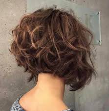 Part your thick, wide curls to the side or in the middle to create a nice rounded. The Chicest Layered Haircuts For Any Hair Type Short Layered Curly Hair Short Layered Haircuts Short Curly Haircuts