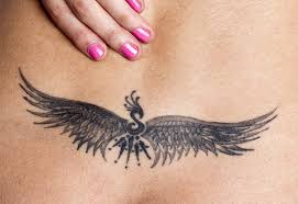 Most men have no idea that their back is a blank canvas that begs for design. Unisex Lower Back Tattoo Pictures Lovetoknow