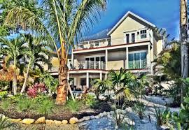 Approaching the front door you are awed by the setting of large live oaks and the way the home is situated on the curve of the land. Contact Us Custom Home Builders Anna Maria Fl Moss Builders