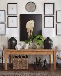 Our Favorite Kind Of Mix Wood Console Table Black Table Lamps Horse Art Over The Entryway Table Gallery Wall In The Entryway Interior Black Table Lamps