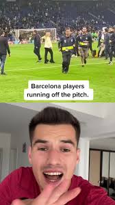 Barcelona Team Rushing Off the Field