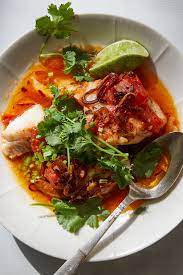 Tomato Poached Fish With Chile Oil And Herbs Recipe Recipe In 2021 Poached Fish How To Cook Fish Nyt Cooking