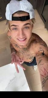 Jaden Crossed Tattoo