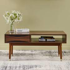 You can choose a simple table that's basically four legs and a tabletop, and that's just fine for many people. Midcentury Modern Wooden Coffee Table Teamson Home Uk