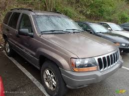 Image result for Woodland Brown 2002 Jeep