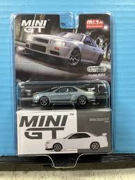 164 MINI GT NISSAN SKYLINE GT-R R34 WHITE RAW CHASE 1165 | eBay