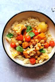 This famous and delicious moroccan dish features a mound of steamed couscous topped with seven different stewed vegetables and meat. Moroccan Roasted Chickpeas And Vegetables With Couscous Joanne Eats Well With Others