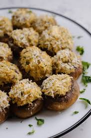 Carefully pop off the mushrooms stems, right where it connects to the cap. Crab Stuffed Mushrooms