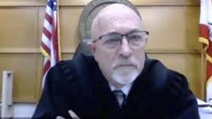 Theatre drama as surgeon Zooms to court in middle of an operation