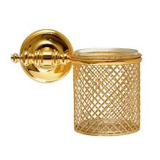 This contemporary vanity design is a nice juxtaposition to the heavily patterned wallcovering in this small but mighty bathroom. 20 Gold Bathroom Accessories Gold Colored Bath Decor Ideas