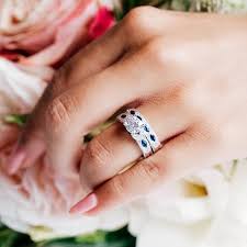 Photos of moissanite engagement rings and wedding bands. Engraved Sapphire Floral Diamond Wedding Band Kirk Kara