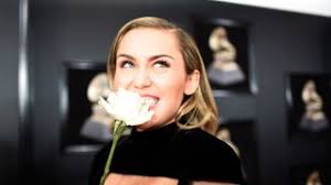 Why Are Celebrities Wearing White Roses?