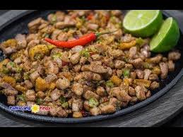 Sizzling Tuna Sisig Is A Version Of The Popular Filipino Sisig Wherein Tuna Steaks Sliced Into Small Cubes Are Used Instead Sisig Sisig Recipe Seafood Recipes