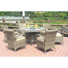 Turin Round Outdoor 7 Piece Patio Wicker Dining Set With Eton Chairs By Direct Wicker Wicker Dining Set Outdoor Dining Set Outdoor Furniture Sets